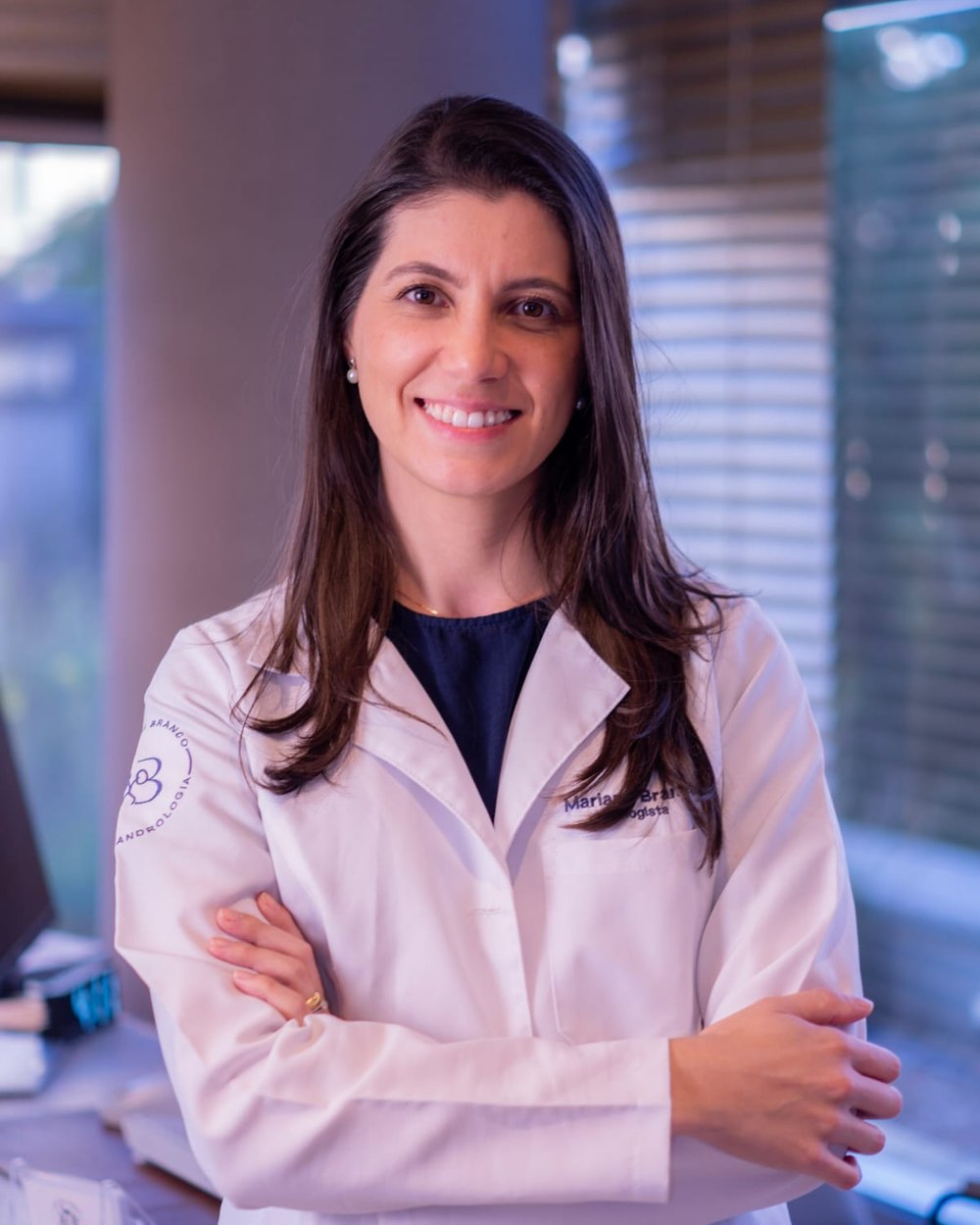Dra. Mariane Branco, médica urologista, de jaleco